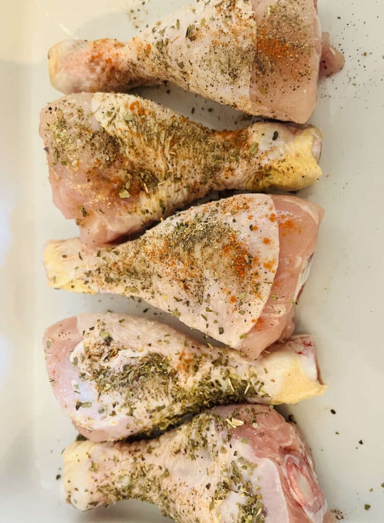 Uncooked marinated chicken ready to go in the oven