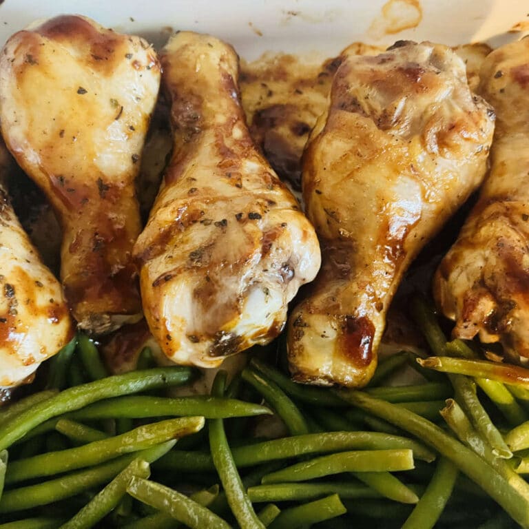 Oven baked BBQ chicken drumsticks with green beans