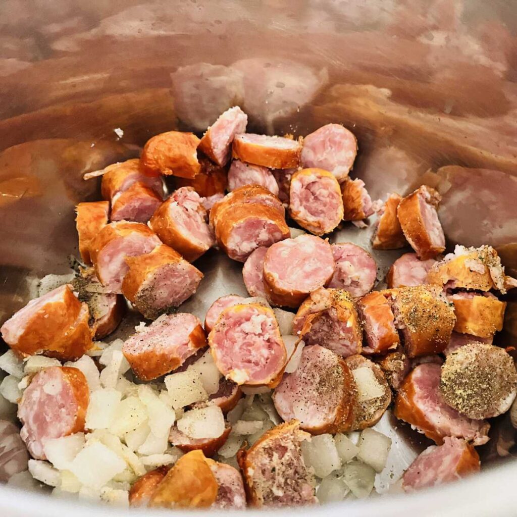 Sausages and onions in Instant pot before adding pasta