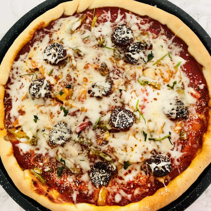 Spanish pizza with chorizo and peppers 1