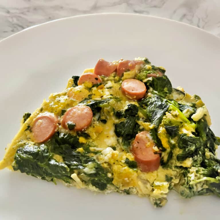 Spinach, egg, sausages and cheese frittata