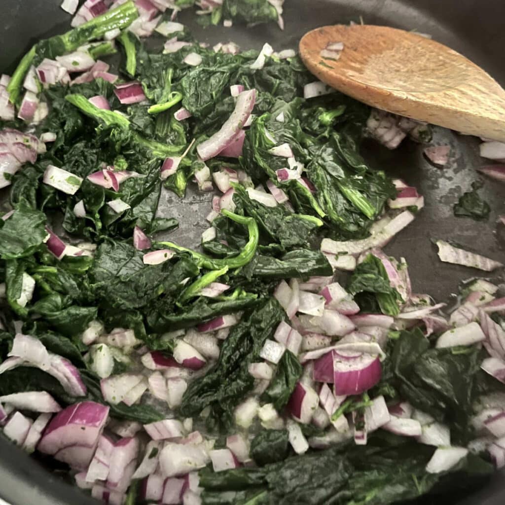 Spinach cooking with the onions