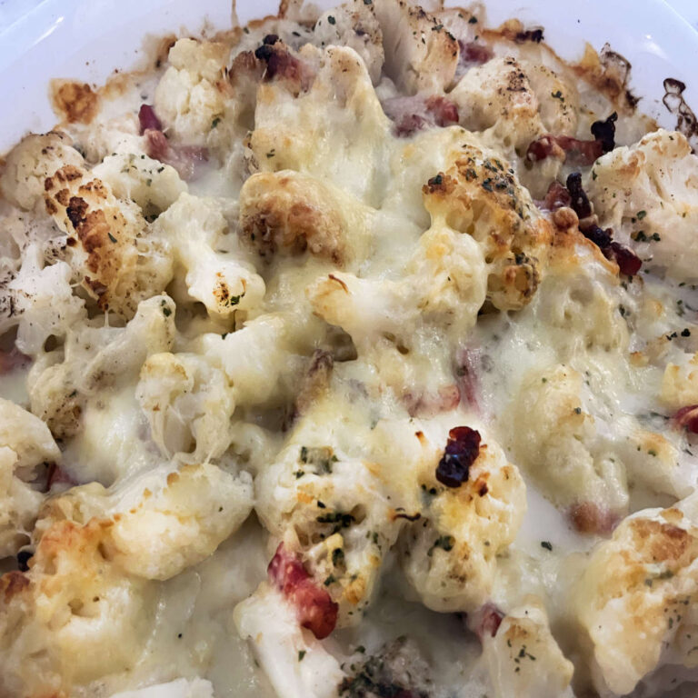 Creamy cauliflower casserole with bacon and cheese