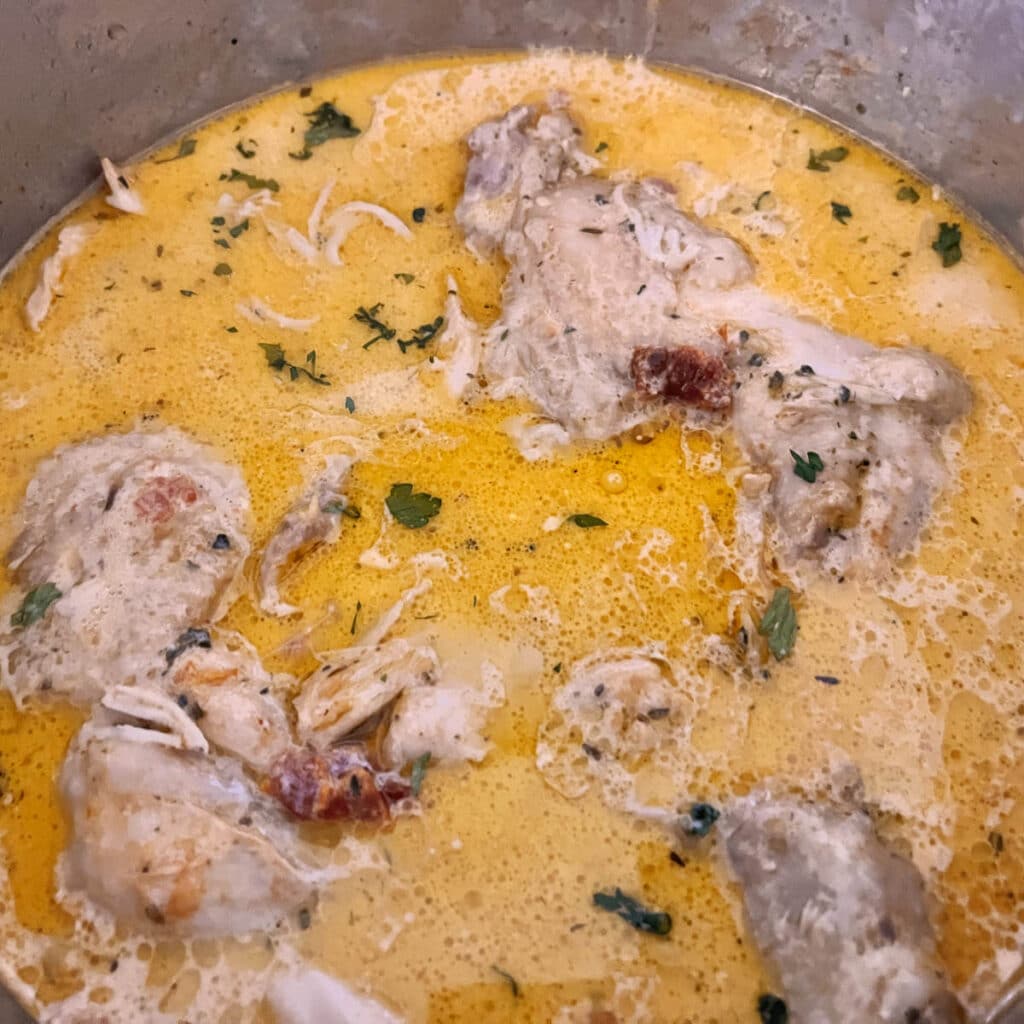Sun-dried tomato chicken cooking in the Instant Pot