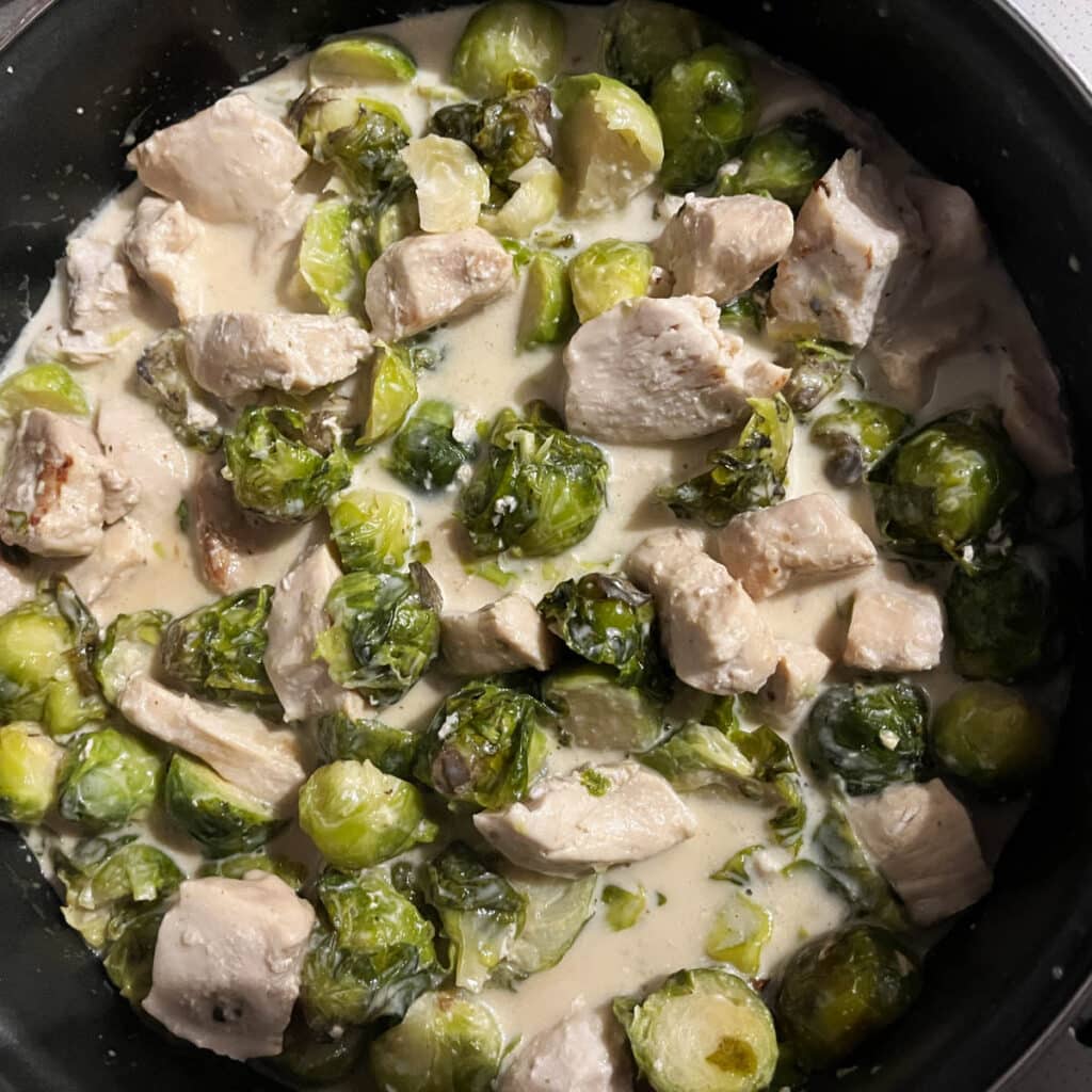 Cream added to the chicken and brussels sprouts