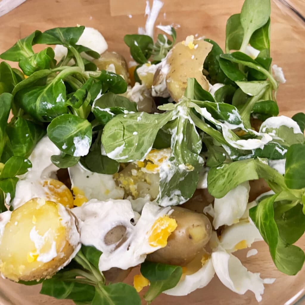 Potato egg salad with greens added